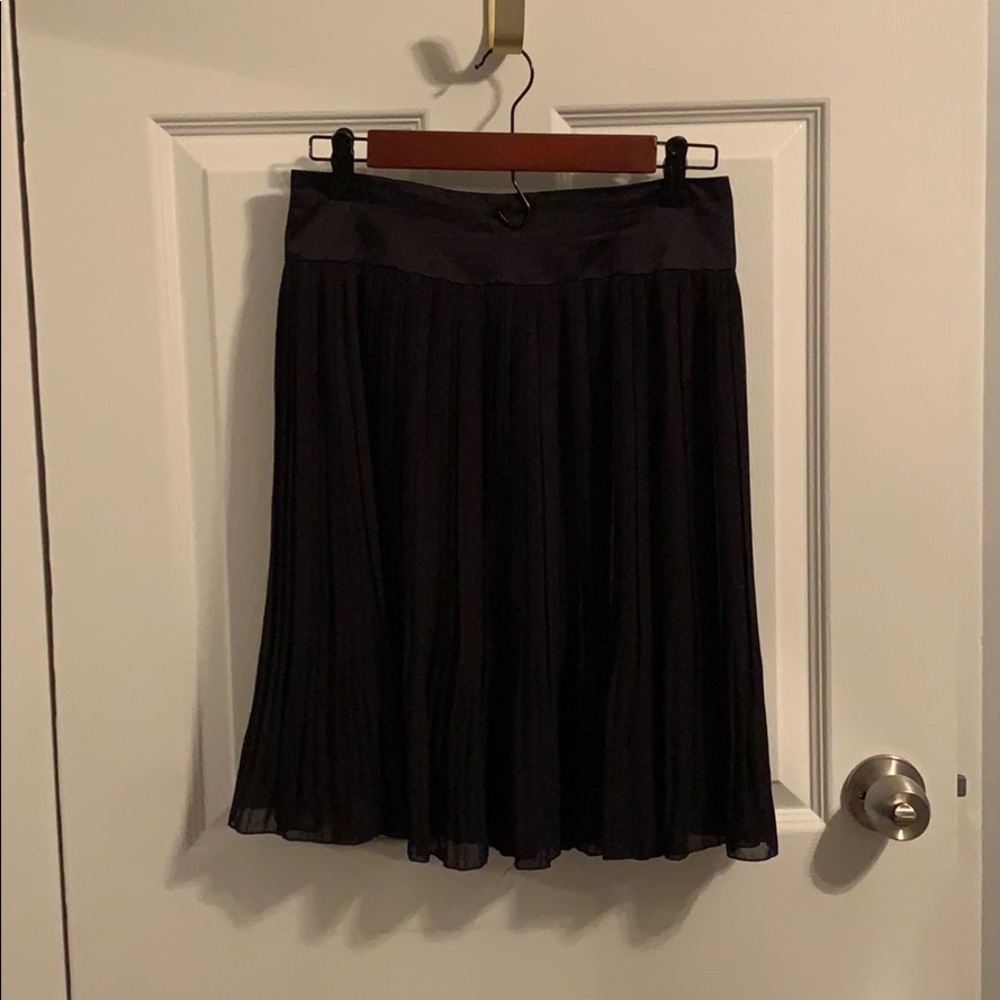 Dark navy blue, pleated, knee length, bell skirt